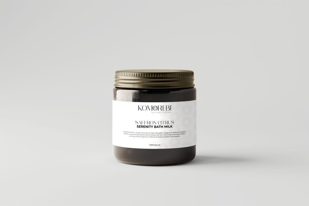Komorebi Saffron Citrus Serenity Bath Milk in an amber glass jar with a gold lid